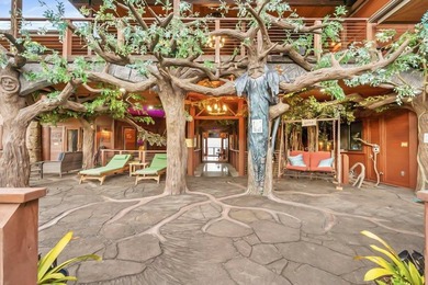 Set on 9.63 acres outside Hilo, this furnished 8-bedroom, 8-bath - photo 3