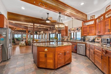 Set on 9.63 acres outside Hilo, this furnished 8-bedroom, 8-bath - photo 4
