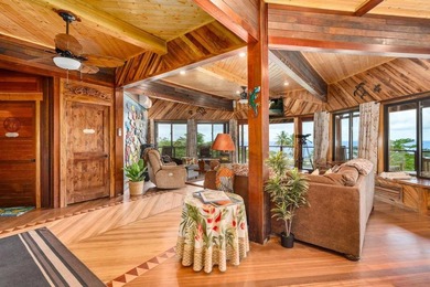 Set on 9.63 acres outside Hilo, this furnished 8-bedroom, 8-bath - photo 8