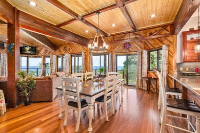 Set on 9.63 acres outside Hilo, this furnished 8-bedroom, 8-bath - photo 9