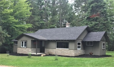 BASS LAKE - RHINELANDER CHAIN Cottage SOLD - Lake Home SOLD! in Pine Lake, Wisconsin
