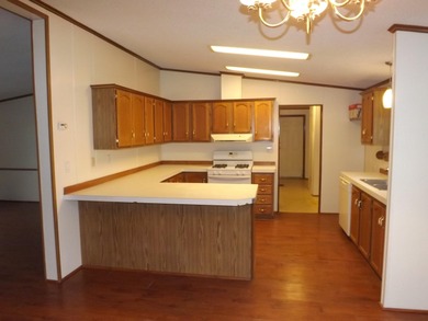 Located in the highly desirable Crescent Wood Village (off 11400