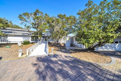 PRICE REDUCED !!Upon entering the gates of Four Mile Village you - photo 4