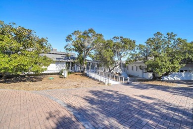 PRICE REDUCED !!Upon entering the gates of Four Mile Village you - photo 6