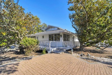 PRICE REDUCED !!Upon entering the gates of Four Mile Village you - photo 7