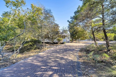 PRICE REDUCED !!Upon entering the gates of Four Mile Village you - photo 8