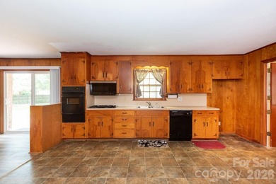Welcome to this classic 1960s ranch-style home, perfectly - photo 10