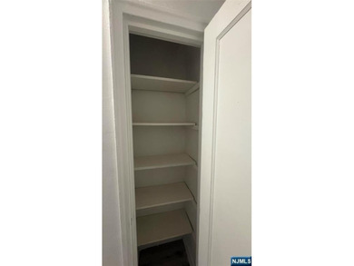 Welcome to Unit A7 at 2335 Hudson Terrace, a renovated 2-bedroom