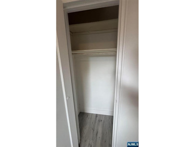 Welcome to Unit A7 at 2335 Hudson Terrace, a renovated 2-bedroom