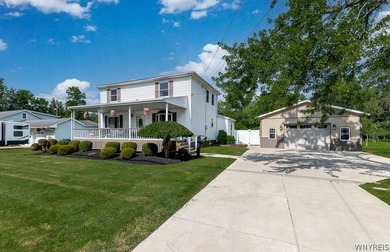 Welcome home to 212 East Ave! This inviting two-story home sits - photo 2