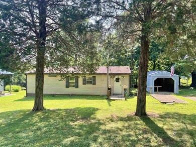 Welcome to lake life at Rough River Lake! This fully furnished - photo 1