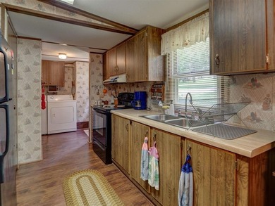 Welcome to lake life at Rough River Lake! This fully furnished - photo 5