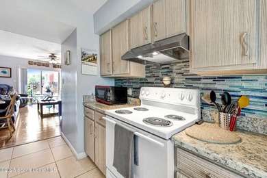 Welcome home to a spacious 3 bedroom, 2 bathroom beachside condo - photo 11