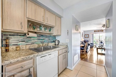Welcome home to a spacious 3 bedroom, 2 bathroom beachside condo - photo 12