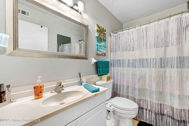 Welcome home to a spacious 3 bedroom, 2 bathroom beachside condo - photo 15