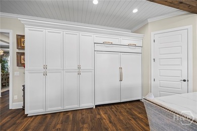Thoughtfully designed around the ease of main-level living, this - photo 17