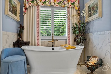 Thoughtfully designed around the ease of main-level living, this - photo 35