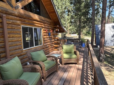 Escape to this turnkey log cabin tucked away at the end of a - photo 4