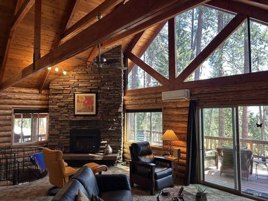 Escape to this turnkey log cabin tucked away at the end of a - photo 5