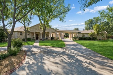 Tucked beneath a canopy of mature trees on two beautifully - photo 4