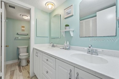 Located right in the heart of Forest Beach, this 2 bed/2 bath - photo 12