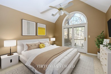 Exceptional Saddle Ridge townhome in the heart of Reynolds Lake