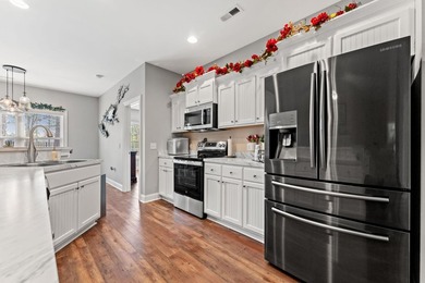 Welcome to this beautifully customized ranch style home located - photo 11