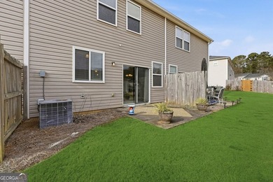 Built in 2005, this 1,551 sq. ft. 2-story townhome features 3 - photo 4
