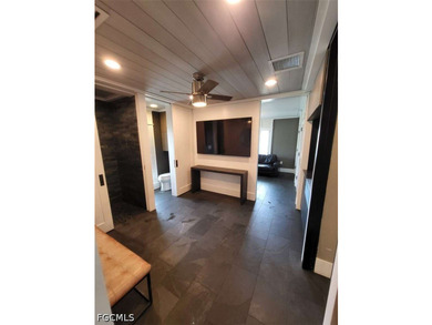 Experience refined Naples living in this beautifully updated - photo 11