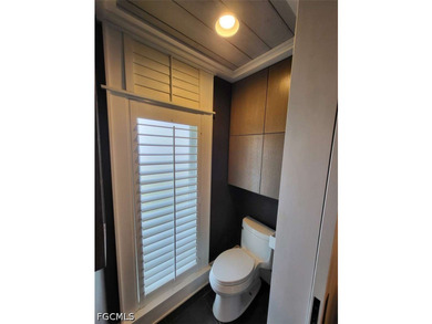 Experience refined Naples living in this beautifully updated - photo 12