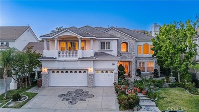 Located in the prestigious Vista del Verde community of Yorba - photo 2