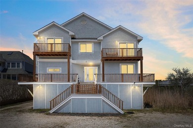 Escape to 818 Dune Road, a stunning bayfront retreat offering 70 - photo 1