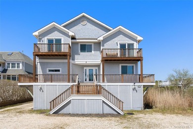 Escape to 818 Dune Road, a stunning bayfront retreat offering 70 - photo 2