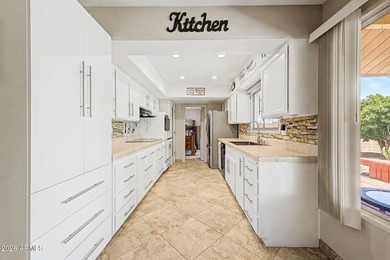 Rare find! Popular remodeled Castillo model in Sun City -- split - photo 11