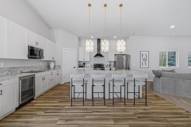This contemporary home is on a half acre lot surrounded by - photo 11