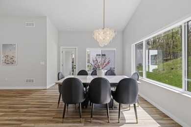This contemporary home is on a half acre lot surrounded by - photo 14