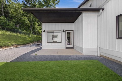 This contemporary home is on a half acre lot surrounded by - photo 15