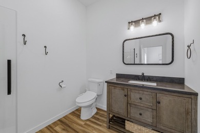 This contemporary home is on a half acre lot surrounded by - photo 22