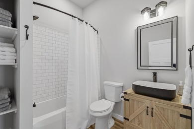 This contemporary home is on a half acre lot surrounded by - photo 25