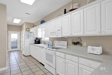 This isn't just a beach house; it's a coastal asset designed to - photo 9
