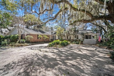 Set on a .66-acre waterfront lot along tidal Battery Creek, this - photo 1