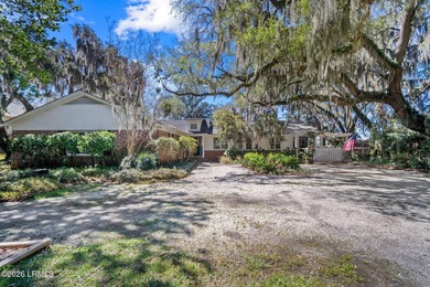 Set on a .66-acre waterfront lot along tidal Battery Creek, this - photo 2