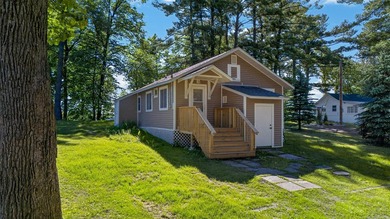 Enjoy 62 feet of shoreline on beautiful Pokegama Lake located - photo 3