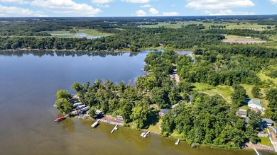 Enjoy 62 feet of shoreline on beautiful Pokegama Lake located - photo 7