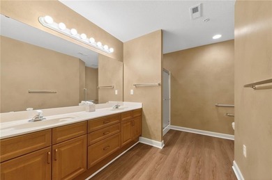 Welcome home to this bright and inviting 2-bedroom, 2-bath villa