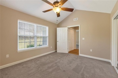 Welcome home to this bright and inviting 2-bedroom, 2-bath villa