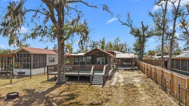 Located in Flood Zone X on a high and dry 0.13-acre lot, this - photo 1