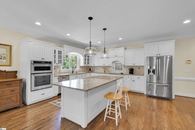 Spacious full-brick 4-bedroom, 3-bath home with a primary suite - photo 9