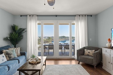 Welcome to this well-kept, updated Laketown Wharf residence - photo 1