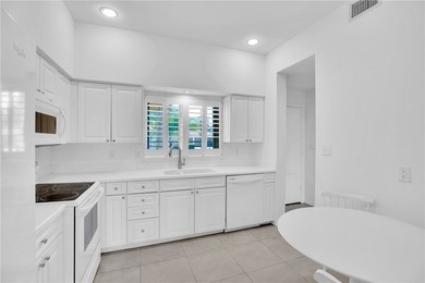 Enjoy the fabulous lifestyle of Grand Harbor! Rare 1st floor - photo 2